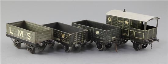 A set of four: GWR Guards van, by Bassett Lowke, No 35642, GWR 5 plank open wagon by Bassett Lowke, No 91694,